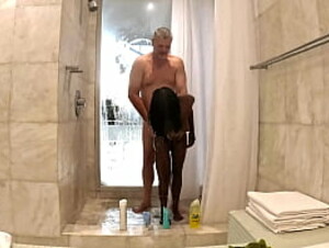 Sexy Black Milf takes a hot steamy shower with white sugar daddy at his penthouse