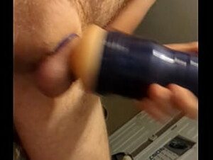 Using a Fleshlight to edge two loads out of my thick cock