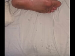 Cumshot on sleepy dirty soles