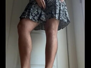 Crossdresser sissy in pretty dress and heels