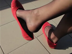 red ballet flats and nylons, balcony shoeplay by Isabelle-Sandrine