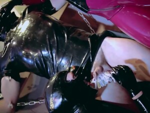 Femdoms Wearing Latex Pegging Slave And Seducing His Cock