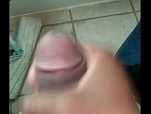 Love To stroke my small cock in the bathroom 9